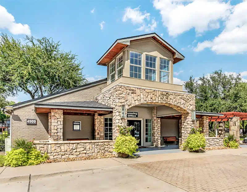 The exterior of the clubhouse at Landmark at Gleneages in Dallas 